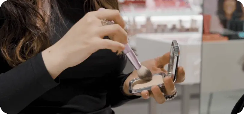 person using kiko milano makeup